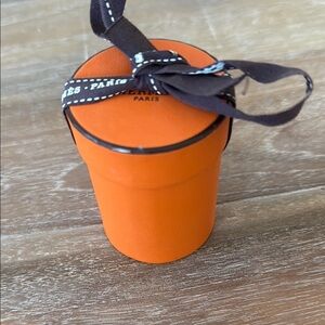 Hermès EMPTY Round Orange Box with Black Logo Ribbon